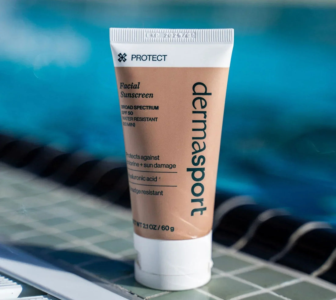 Dermasport SPF 50 Facial Sunscreen standing on a pool deck beside the water, ready for outdoor training and sun protection.