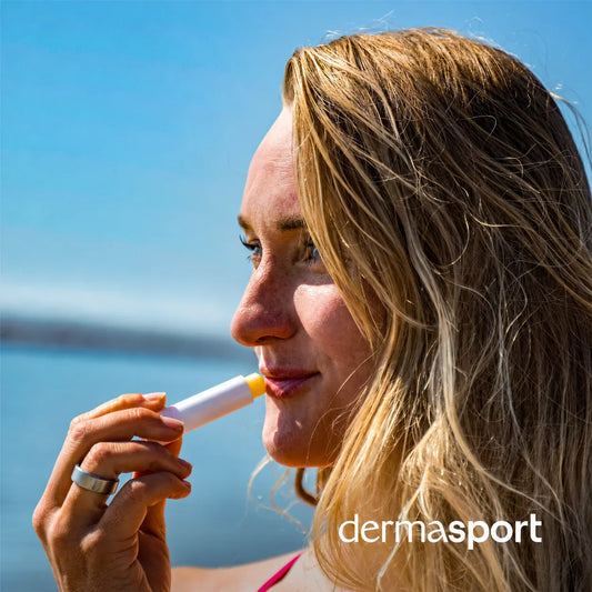 Athletic sun protection essentials featuring SPF lip balm and skincare products packed for outdoor sports and training.